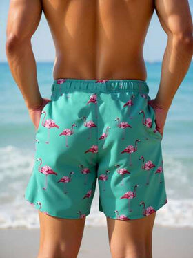 Manfinity Swimmode شورت كاجوال للرجال بخصر مطاطي وجيوب بطبعة فلامنجو