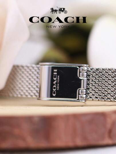 Coach ساعة كادي النسائية ذات المينا البيضاء والسوار الفضي من نوع ميلانيز