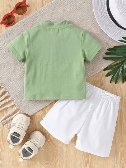 SHEIN Playful Pals مجموعة قميص كم قصير بياقة مندرين أنيقة وبسيطة وبنطلون بلون متباين مناسبة للأطفال الصبية في الصيف، قطعتان