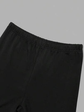 SHEIN Sparklyn طقم ملابس صيفي للفتيات المراهقات، تي شيرت فضفاض بياقة دائرية وألوان متباينة مع شورت ضيق مصنوع من الجيرسيه، بتصميم أبيض وأسود، موضة الشارع الصيفية