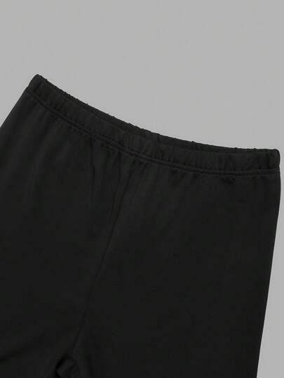 SHEIN Sparklyn طقم ملابس صيفي للفتيات المراهقات، تي شيرت فضفاض بياقة دائرية وألوان متباينة مع شورت ضيق مصنوع من الجيرسيه، بتصميم أبيض وأسود، موضة الشارع الصيفية