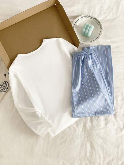 SHEIN Vintaside Kids مجموعة بيجامات مخططة للأولاد قطعتين، بنطلون مخطط أبيض وأزرق، ولباس علوي طويلة الأكمام بطبعة حرفية بيضاء، قماش ناعم وقابل للتنفس، مناسب للربيع والخريف، وهدية رائعة للأطفال