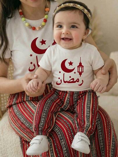 طقم قصير الأكمام وشورت مخطط مريح وعملي للرضع البنات
