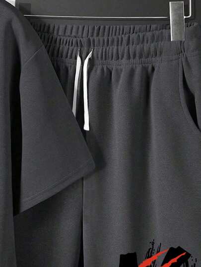 طقم تيشيرت بأكمام قصيرة وشورت مطبوع عليه رسوم كرتونية للأولاد الشباب