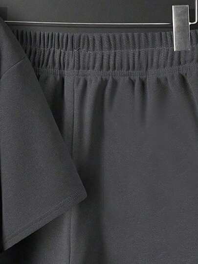 طقم تيشيرت بأكمام قصيرة وشورت مطبوع عليه رسوم كرتونية للأولاد الشباب