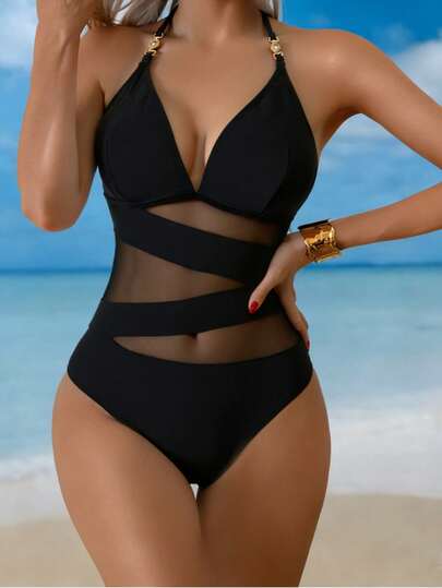 Swim Lushoire بدلة سباحة نسائية بقطعة واحدة مزينة بزخارف معدنية، بتصميم رقبة على شكل حرف V وتقطيع شفاف، مناسبة للعطلات الشاطئية