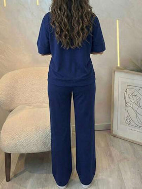 ملابس نسائية مريحة من قطعتين، ملابس علوية كم قصير بلون سادة مقترنة مع بنطلون ذو خصر مطاطي وجيوب، من قماش بولي إستر-سبانديكس، مناسبة للربيع والصيف