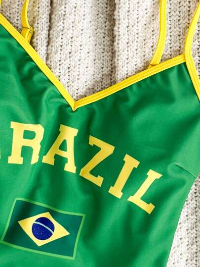 Swim SXY بدلة سباحة كاجوال للنساء موديل ربيع/صيف 2026 بطبعة علم وطني على الكتف وظهر مكشوف مناسبة للشاطئ والعطلات