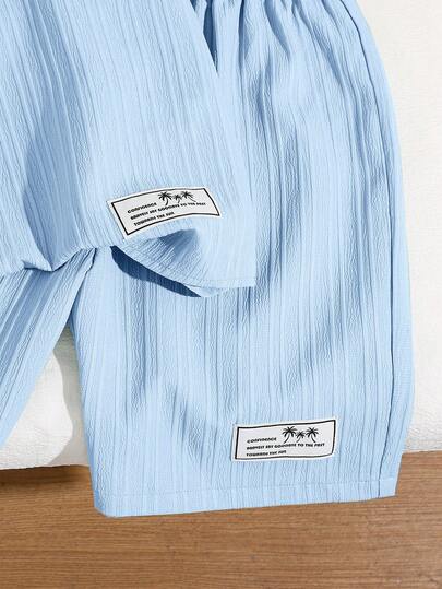 SHEIN ملابس كاجوال عطلة للفتى المراهق بطراز كوري بياقة مندرين وسحاب نصفي وأكمام قصيرة مع شورت مطبوع مجموعة من قطعتين