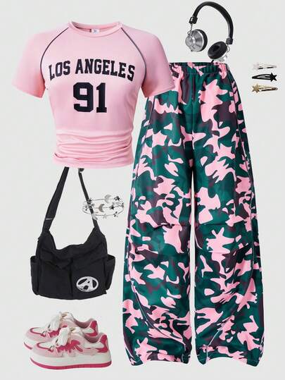 SHEIN مجموعة مكونة من قطعتين للفتيات المراهقات تتميز بتصميم كاجوال وعملي وأنيق، تتكون من تي شيرت مطبوع عليه أرقام وكلمات إنجليزية مع شرائط عاكسة، وبنطلون فضفاض. مناسب للمشي والتسوق والخروجات المدرسية والملابس اليومية. يمكن ارتداؤه مع جاكيت أو سترة.
