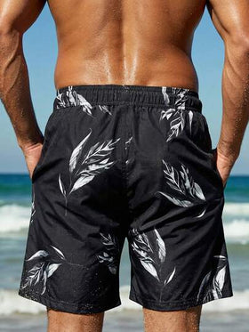 Manfinity Swimmode شورت كاجوال للشاطئ للرجال بخصر مرن وجيوب بطبعة نباتات استوائية