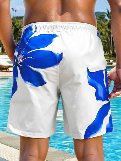 Manfinity Swimmode شورت شاطئ مطبوع بنقشة زهرية مع رباط خصر للرجال