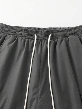 Manfinity Homme شورت رجالي بجيب لون أحادي الخصر بسحاب كاجوال فضفاض، شورت كاجوال رجالي، شورت كارجو للرجال