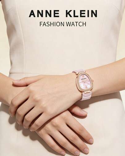 Anne Klein ساعة يد نسائية أنيقة بسوار من السيراميك الأسود، ساعة كوارتز تناظرية رفيعة للنساء، مزودة بمينا أسود لامع بيضاوي الشكل مرصع بالكريستال، ساعة يد نسائية أنيقة بسوار قابل للتعديل
