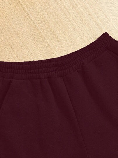 SHEIN طقم رياضي مكون من بلوزة كروب فضفاضة بياقة طاقم وبنطلون رياضي بلون سادة للفتيات المراهقات