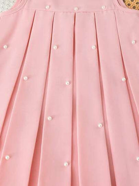 SHEIN فستان كاجوال بدون أكمام للفتاة الصغيرة، مزين بالخرز الاصطناعي وتفاصيل منقوشة، تصميم بسيط وعملي للارتداء اليومي