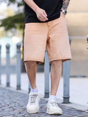 Manfinity Homme شورت جينز فضفاض بجيب مائل بلون أحادي بسيط للرجال للارتداء اليومي والتنقل، صيفي
