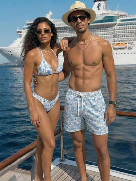 Manfinity Swimmode شورت شاطئ فضفاض بخصر رباط وجيوب مائلة، بطبعة كائنات بحرية على الجميع، لأسلوب الإجازات الصيفية الكاجوال للرجال