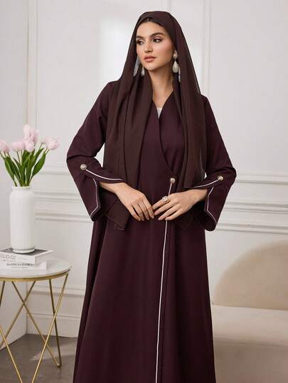 Al Najma عباءة نسائية طويلة الأكمام بتصميم تريم وأزرار ذهبية، مناسبة للارتداء اليومي والتنقل