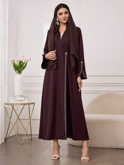 Al Najma عباءة نسائية طويلة الأكمام بتصميم تريم وأزرار ذهبية، مناسبة للارتداء اليومي والتنقل