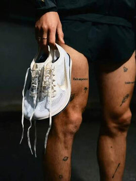 Nike حذاء سبايك جري وركض مسافات طويلة من نايك دراجونفلاي 2 إليت، مريح ومتعدد الاستخدامات وداعم، قصير الكاحل، للرجال