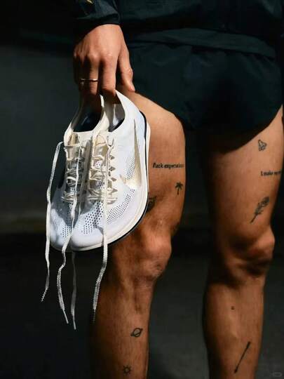 Nike حذاء سبايك جري وركض مسافات طويلة من نايك دراجونفلاي 2 إليت، مريح ومتعدد الاستخدامات وداعم، قصير الكاحل، للرجال
