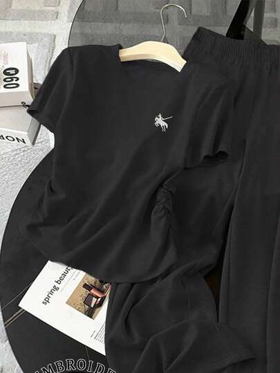SHEIN مجموعة ملابس علوية أكمام قصيرة رقبة دائرية مطرز وبنطلون طويل خصر مطاطي للنساء 2 قطعة