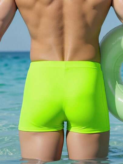 Manfinity Swimmode شورت سباحة كاجوال للرجال بطبعة خضراء فلورسنت للعطلات
