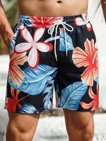 Manfinity Swimmode شورت كاجوال للرجال بخصر مرن وجيوب بطبعة زهور