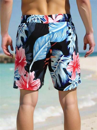 Manfinity Swimmode شورت كاجوال للرجال بخصر مرن وجيوب بطبعة زهور