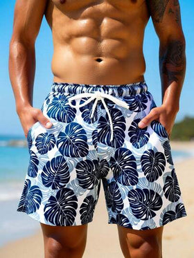 Manfinity Swimmode شورت كاجوال للرجال بخصر مرن وجيوب بطبعة أوراق