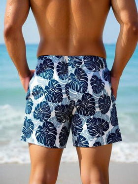 Manfinity Swimmode شورت كاجوال للرجال بخصر مرن وجيوب بطبعة أوراق