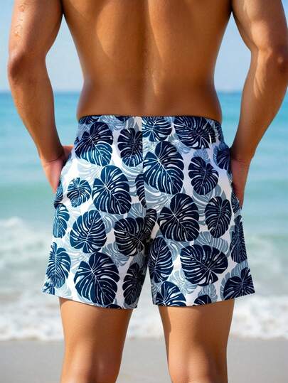 Manfinity Swimmode شورت كاجوال للرجال بخصر مرن وجيوب بطبعة أوراق