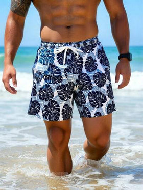 Manfinity Swimmode شورت كاجوال للرجال بخصر مرن وجيوب بطبعة أوراق