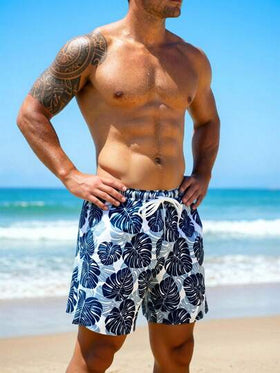 Manfinity Swimmode شورت كاجوال للرجال بخصر مرن وجيوب بطبعة أوراق