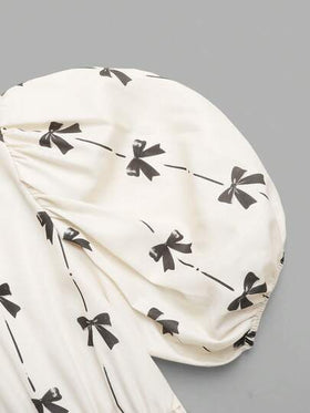 SHEIN فستان متوسط الطول مع ياقة دائرية فضفاضة وأكمام منتفخة وزخرفة فيونكة للفتيات المراهقات الأنيقات