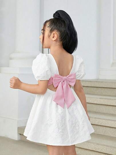 Firerie Kids Firerie Kids فستان كاجوال بدون أكمام مزين بفيونكة وألوان متباينة للفتيات الصغيرات من نوفا جلو