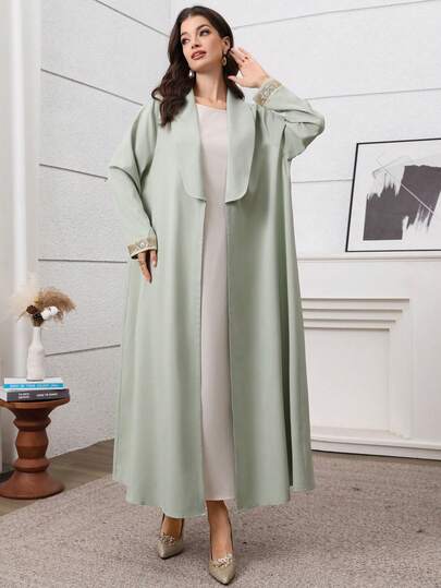 Al Najma رمضان عباءة أنيقة فاخرة مزينة بالتصميم المرقع والدانتيل الذهبي ذات الياقة الخضراء للخروجات والمناسبات
