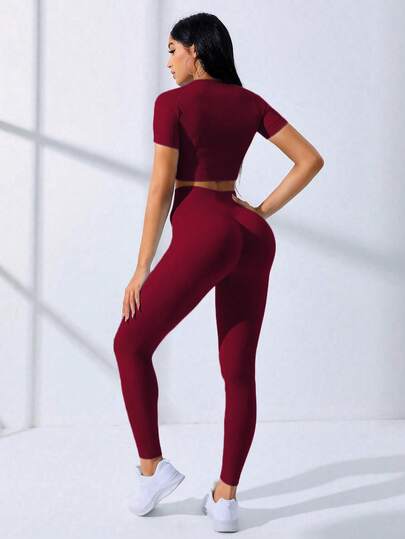 SHEIN Core Rhythm طقم رياضي للنساء يتكون من ملابس علوية قصيرة الأكمام وبنطال طويل عالي الخصر، قطعتان مصنوعتان من قماش مرن لا يترك خطوط، مناسب للتمارين الرياضية والنشاطات الرياضية