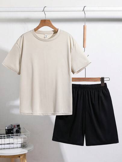 SHEIN مجموعة قميص وشورت للأولاد المراهقين 2 قطعة، قميص كاجوال بطباعة حرف كبير على الظهر وشورت مجموعة، مناسبة للخروجات والأنشطة الخارجية وحفلات العطلات والشاطئ في الصيف والربيع