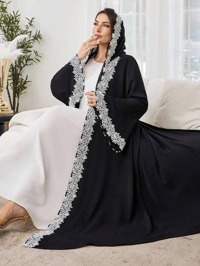 Al Najma عباءة نسائية أنيقة ذات لون أحادي بتصميم عربي بأكمام واسعة مزينة بزخارف زهرية