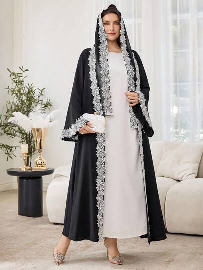 Al Najma عباءة نسائية أنيقة ذات لون أحادي بتصميم عربي بأكمام واسعة مزينة بزخارف زهرية