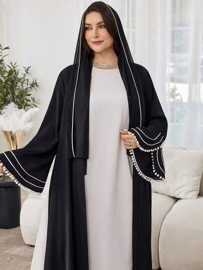Al Najma عباية أنيقة بتصميم لحمة مع أكمام واسعة وكرات صوفية للنساء ذوات الأحجام الكبيرة