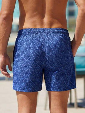Manfinity Swimmode شورت شاطئ مطبوع بالكامل مع خصر رباط للرجال في الصيف