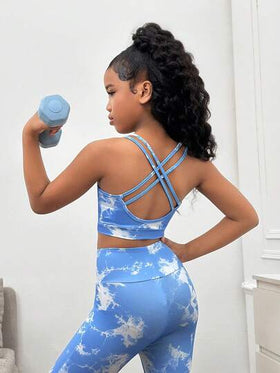 SHEIN مجموعة رياضية للبنات المراهقات تتكون من كامي قصير بتصميم متقاطع في الظهر وسروال ضيق بخصر عالي، مصنوعة من قماش مرن ومريح مناسب للرياضة واليوم الأول للمدرسة