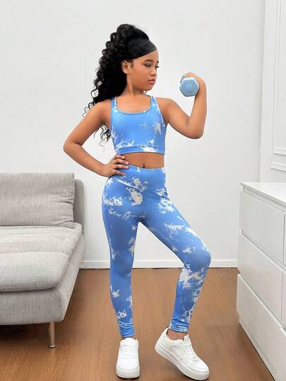 SHEIN مجموعة رياضية للبنات المراهقات تتكون من كامي قصير بتصميم متقاطع في الظهر وسروال ضيق بخصر عالي، مصنوعة من قماش مرن ومريح مناسب للرياضة واليوم الأول للمدرسة