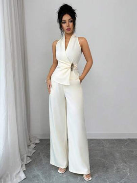 SHEIN Elenzya طقم قطعتين للنساء من توب قصير بدون أكمام وتنورة بلون أحادي مع تصميم ملفوف أمامي
