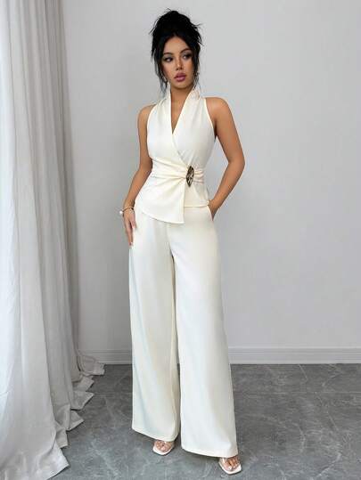 SHEIN Elenzya طقم قطعتين للنساء من توب قصير بدون أكمام وتنورة بلون أحادي مع تصميم ملفوف أمامي