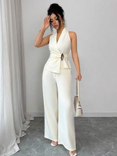 SHEIN Elenzya طقم قطعتين للنساء من توب قصير بدون أكمام وتنورة بلون أحادي مع تصميم ملفوف أمامي