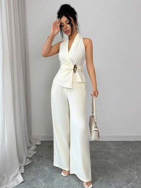 SHEIN Elenzya طقم قطعتين للنساء من توب قصير بدون أكمام وتنورة بلون أحادي مع تصميم ملفوف أمامي